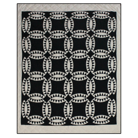 Patch Magic’s Black Wedding Ring Quilt - This black feathered white wedding rings with a black background adorn this quilt with a white border which is 100% Cotton shell and hand layered organic cotton fill. It is hand quilted and hand layered for a unique soft touch and warmth.