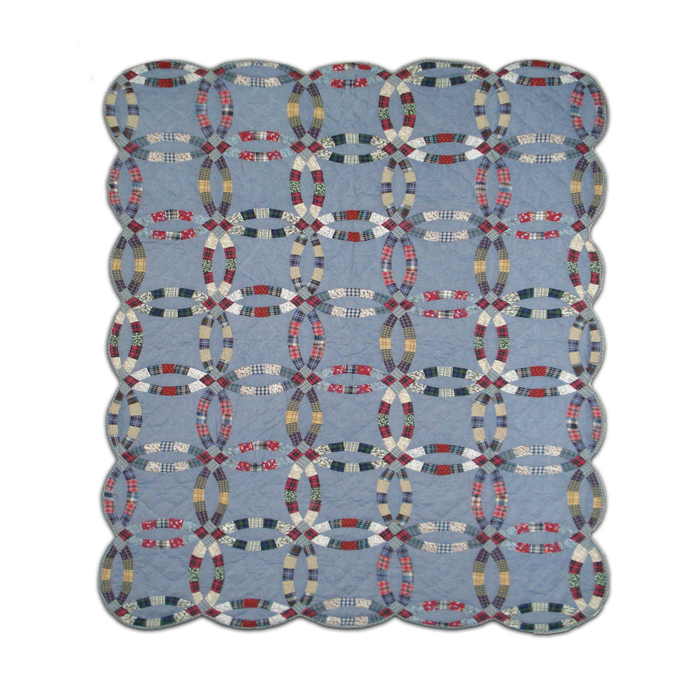 Patch Magic’s – Denim Double wedding ring quilt - Binding circles of colorful plaid on denim is brought together in this unique pattern. With a distinct wedding band cut border style this is sure to catch the eye.