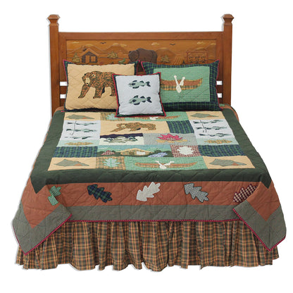 Quilted Cabin Quilt, Hand cut and Appliqued cotton fabric motifs.