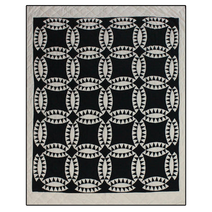 Patch Magic’s Black Wedding Ring Quilt - This black feathered white wedding rings with a black background adorn this quilt with a white border which is 100% Cotton shell and hand layered organic cotton fill. It is hand quilted and hand layered for a unique soft touch and warmth.